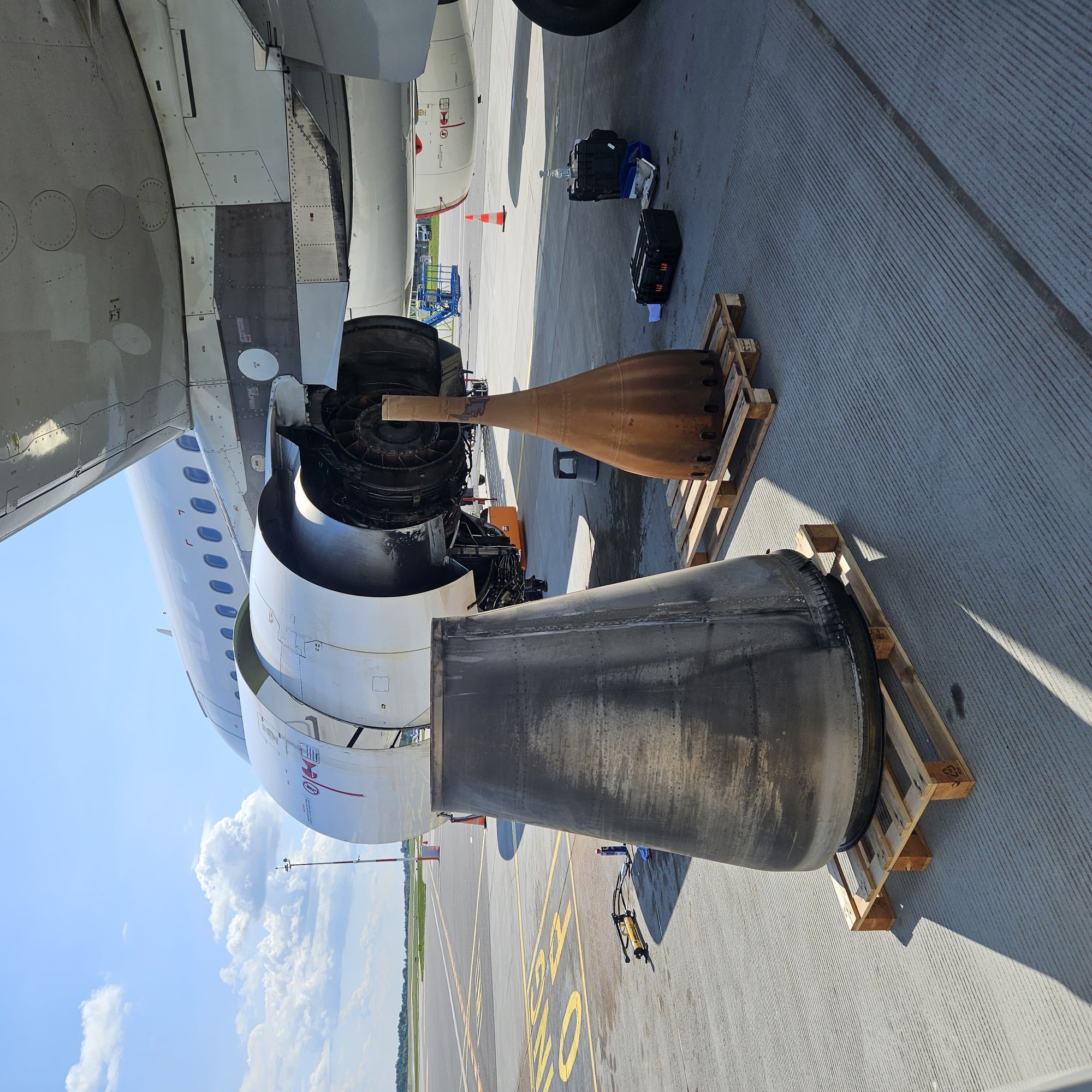 Airbus A320 engine taken apart on a runway
