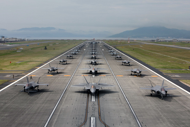 jets chilling in the airport in a formation