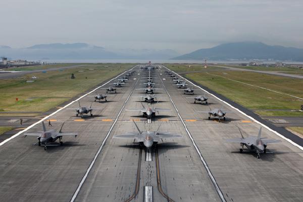 jets chilling in the airport in a formation