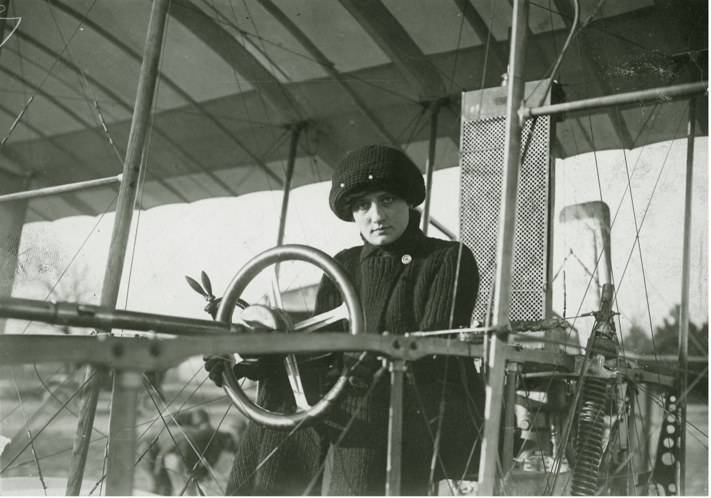 The Baronesse Raymonde de LaRoche seated at the controls of a Voisin 1909 Type biplane, France