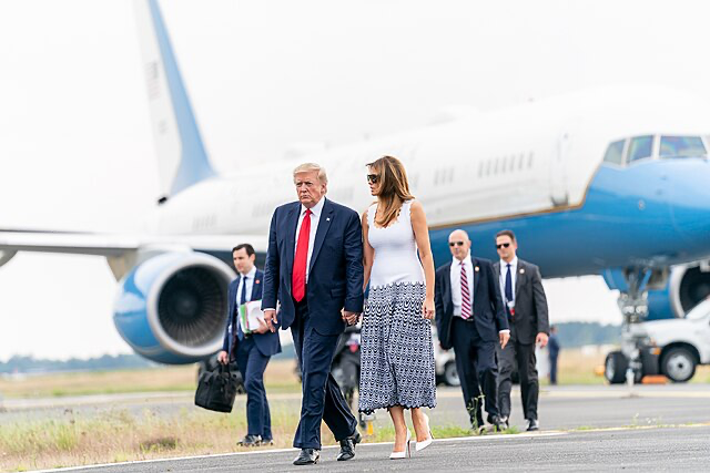 President Donald J. Trump and First Lady Melania Trump walk to Air Force One after arriving at Bordeaux-Merignac Airport in Bordeaux en route to Washington, D.C.
