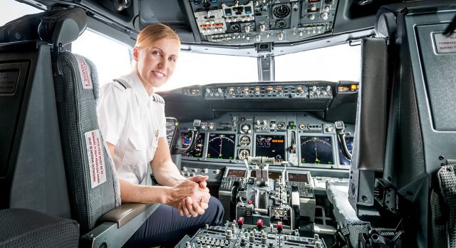 Female pilot in a cockpit