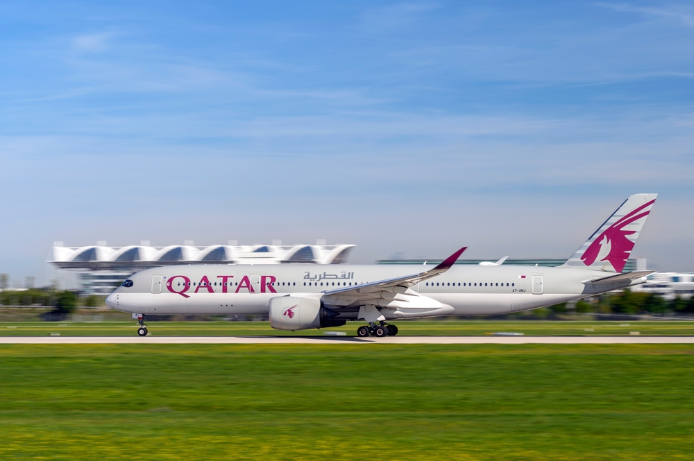 Qatar Airways Airbus starting on the runway of the Munich airport