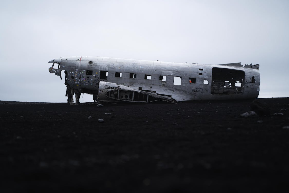 Abandoned Plane Wreck on Desolate Black Beach