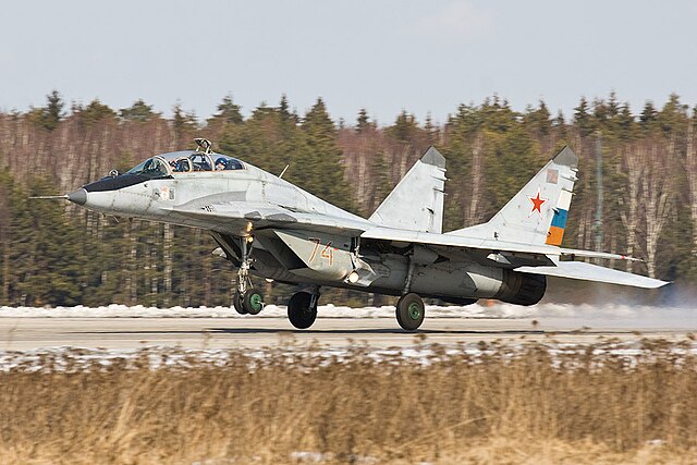 a landing MiG-29 fighter jet