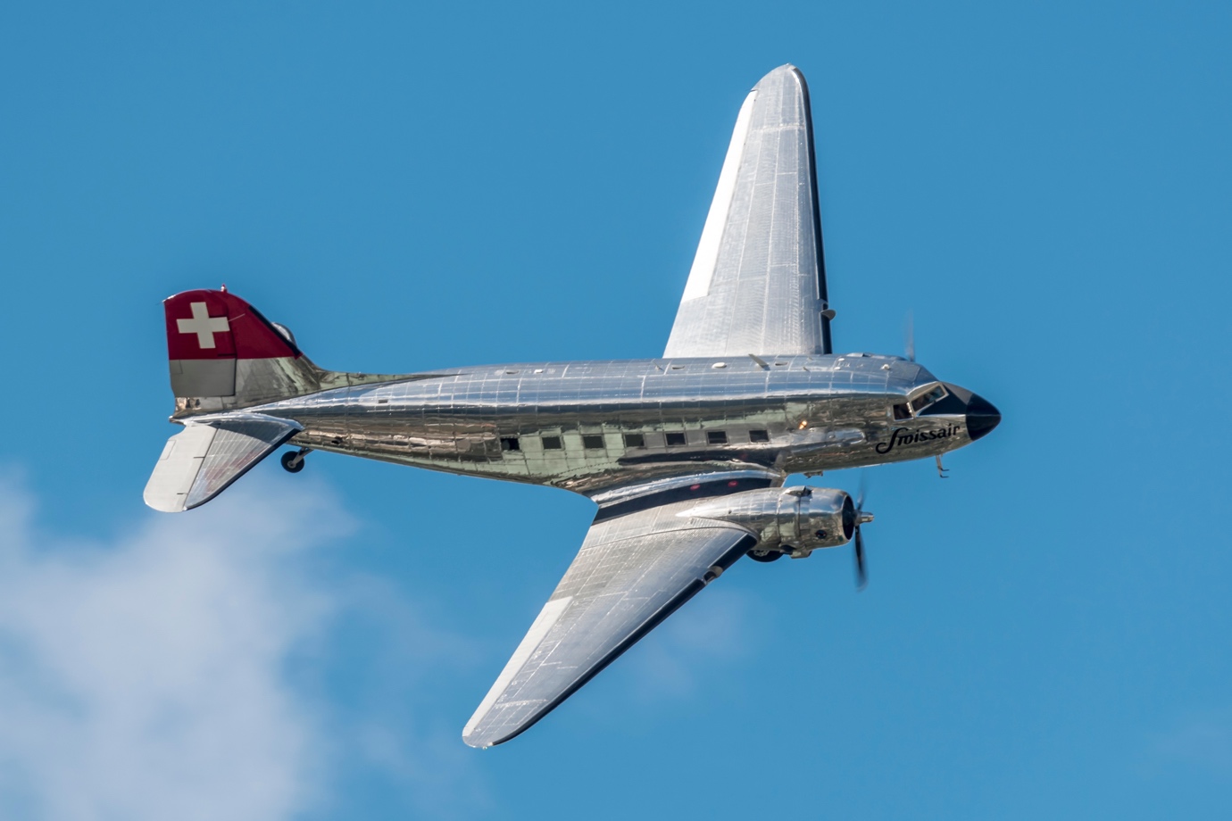 Douglas DC-3 flying in the air. Image from 45 degree angle.