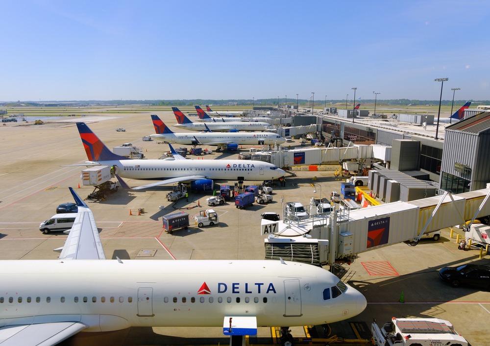 Delta planes parked at the airport gates